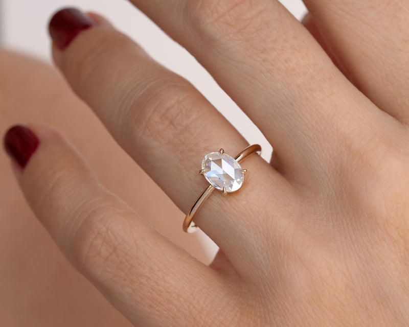 carat rose cut oval solitaire ring on finger