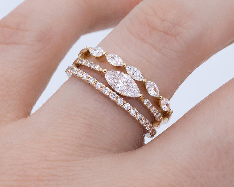 Everett Fine Jewelry Sun King ring stack on hand