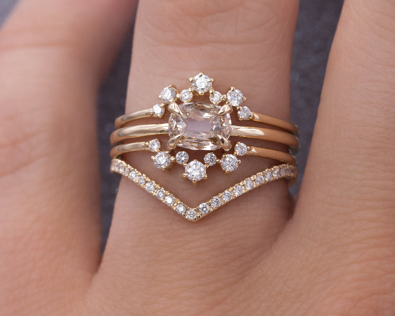14-Karat Yellow Gold East West Cushion Cut 0.52-Carat Champagne Diamond Ring on Hand with Mini Aster and Emma Chevron